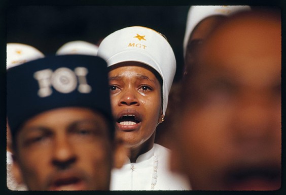 Searching for the Seventies: The Documerica Photography Project, is based on an archive of 22,000 photos taken by the US Environmental Protection Agency. The photo above, taken in 1974, was captioned at the time: 'Religious fervor is mirrored on the face of a Black Muslim woman, one of some 10,000 listening to Elijah Muhammad deliver his annual Savior’s Day message in Chicago.'